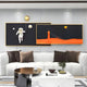 A modern living room features a white sofa with dark pillows and a marble coffee table. The wall is adorned with the 3D Space Astronaut & Lighthouse Dual-Panel Rectangular Wall Art by Giant Sculptures, depicting an astronaut among planets and a desert scene under a starry sky.