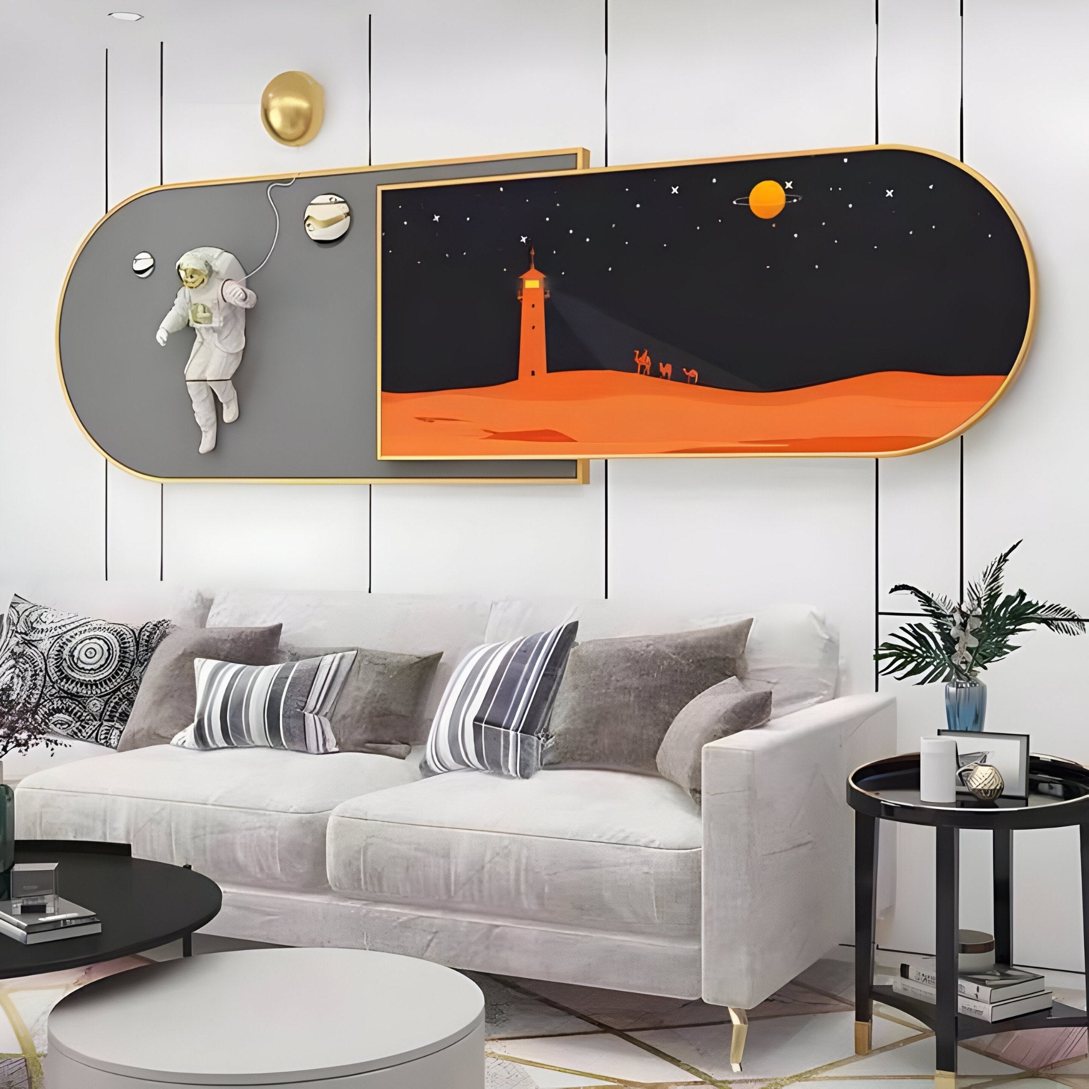 A modern living room features imaginative décor with a white sofa, cushions, and a small round table with a plant. Giant Sculptures 3D Space Astronaut & Lighthouse Dual-Panel Wall Art shares the wall with camels in the desert, while a gold wall light enhances the ambiance.