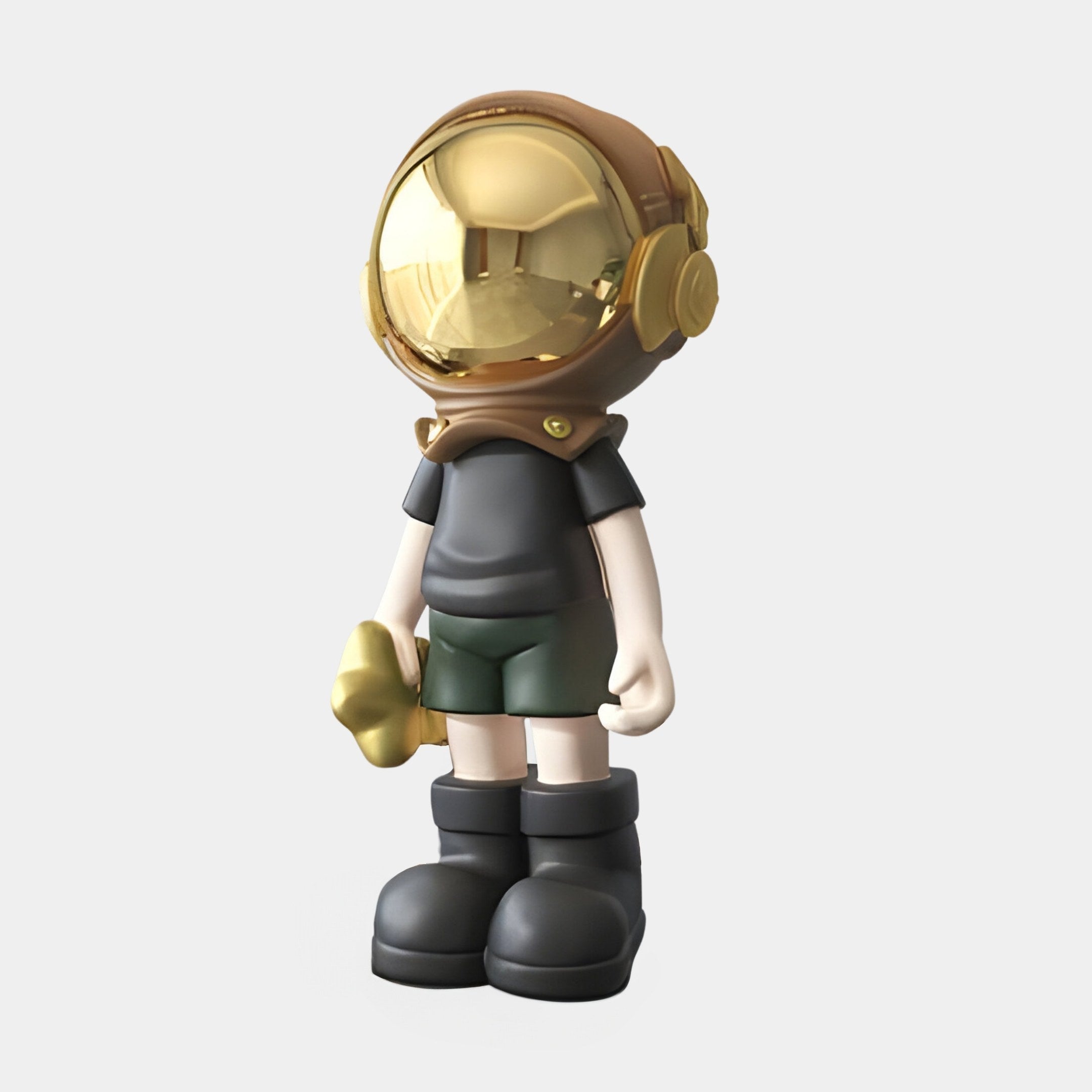 The Midnight Black Astronaut Buddy Figure by Giant Sculptures is a 36cm stylized resin piece with a shiny gold helmet, dark attire, black boots, and a golden object in its right hand. Its smooth, minimalist design adds a futuristic touch to any cosmic décor.