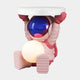 The Stellar Pink Astronaut Glow Side Table Figure by Giant Sculptures features a pink and white astronaut with a shiny blue helmet, holding a tabletop and glowing sphere, adding whimsical ambient light to any room. Height: 50cm.