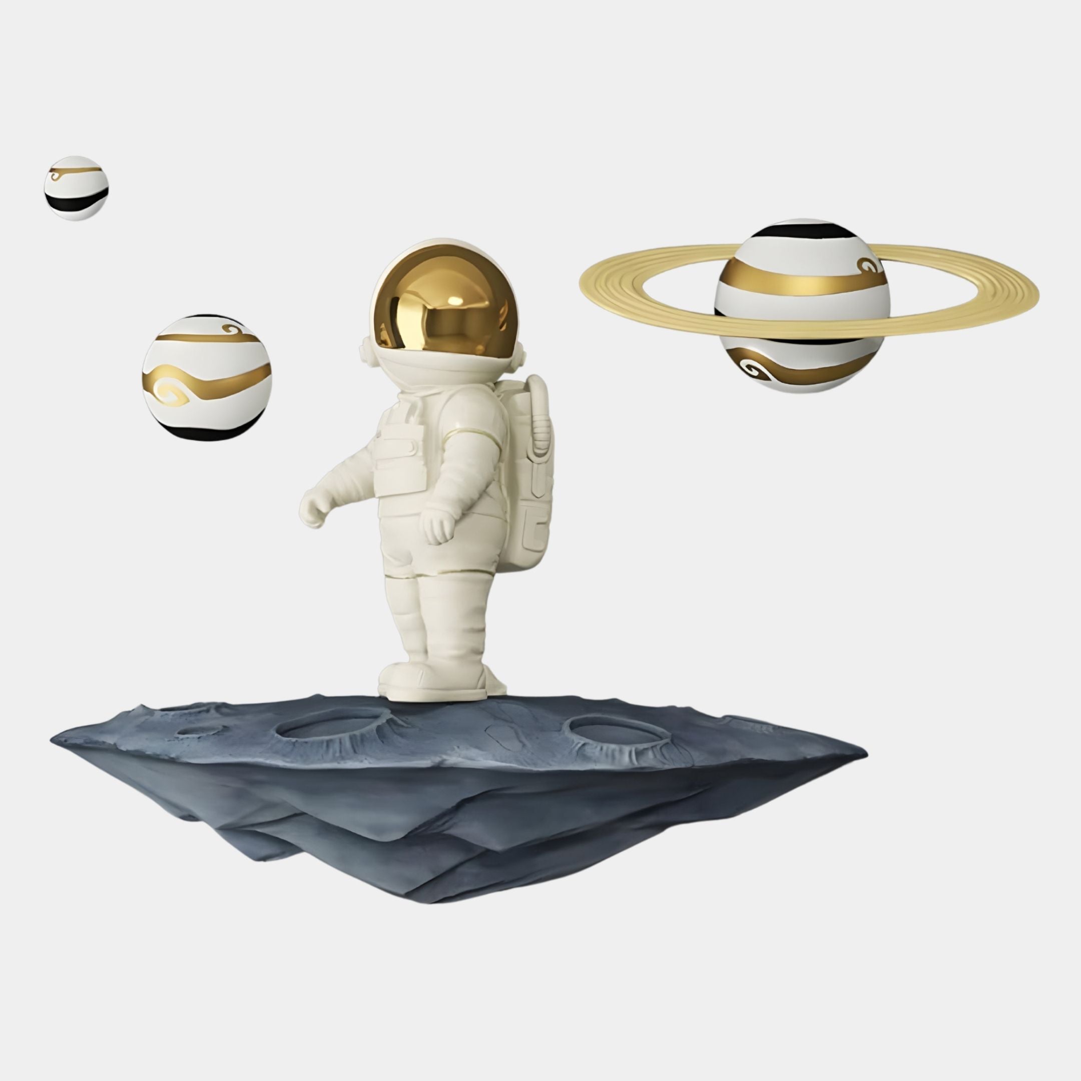 The White & Gold Orbit Odyssey Astronaut 3D Wall Art by Giant Sculptures features a small astronaut with a gold helmet on a floating rock amid black, white, and gold planets—ideal for space lovers and modern decor.