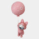 The Pink Astronaut Bunny Balloon 3D Wall Art (58cm) by Giant Sculptures features a playful pink bunny in a shiny helmet clinging to a large balloon—perfect for adding whimsical charm to any space.