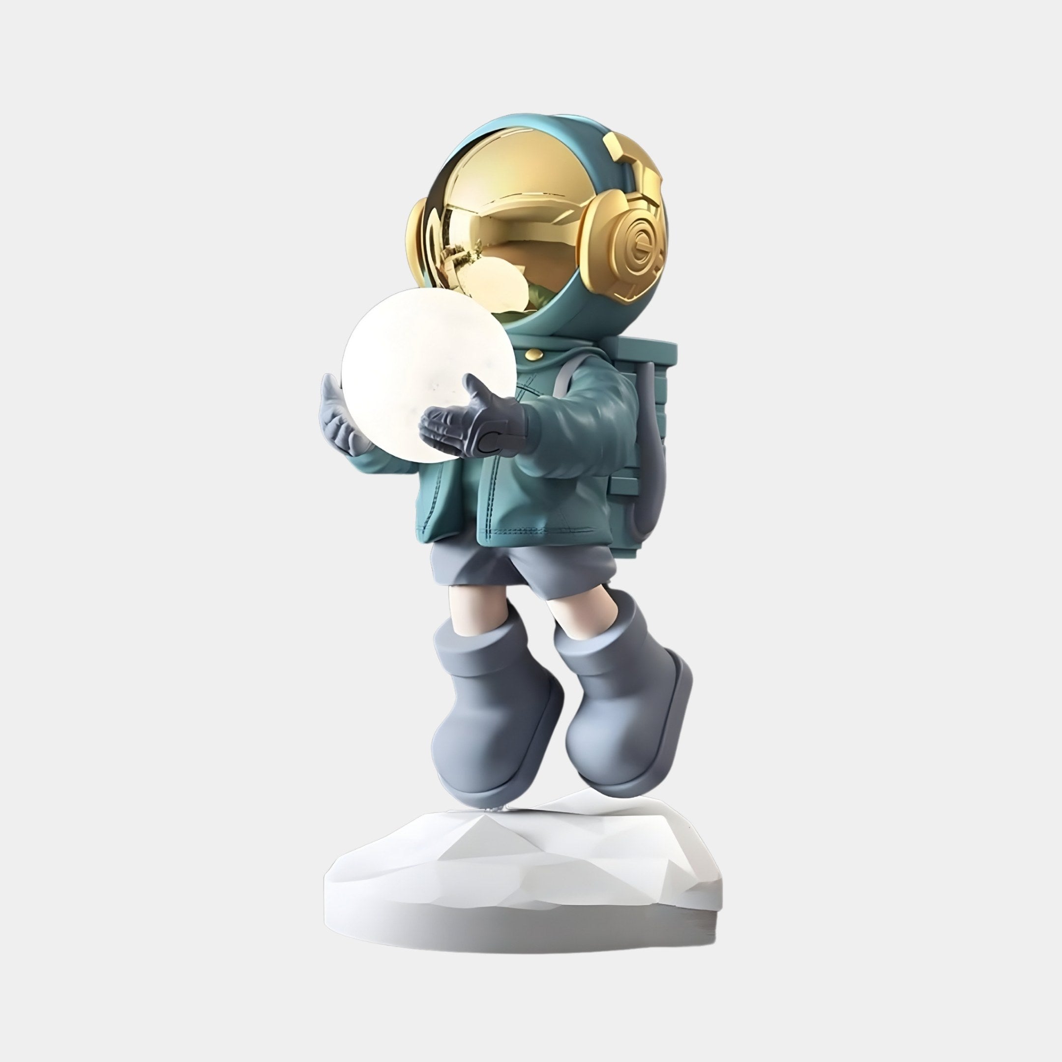 The Galactic Blue Astronaut Glow Hover Sculpture from Giant Sculptures features a celestial 60cm figure in teal attire and gold helmet, gracefully hovering above a rocky surface while holding a glowing orb, seamlessly merging cosmic allure with artistic wonder.