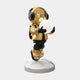 The Celestial Gold Astronaut Glow Hover Sculpture by Giant Sculptures, standing at 60cm, features a gold astronaut with headphones cradling a glowing sphere on a textured white base. It offers touch switch lighting and USB charging, complemented by black gloves and pants.