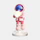 The Giant Sculptures Stellar Pink Astronaut Glow Hover Sculpture, standing 60cm tall, features a glowing sphere and USB charging lamp, helmet with scenic reflection, and crystalline base, merging charm and utility.