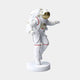 The White Space Astronaut Explorer Sculpture (63cm) by Giant Sculptures features a figure in a white spacesuit with a gold visor on a round base, capturing the essence of space exploration against a solid light gray backdrop.