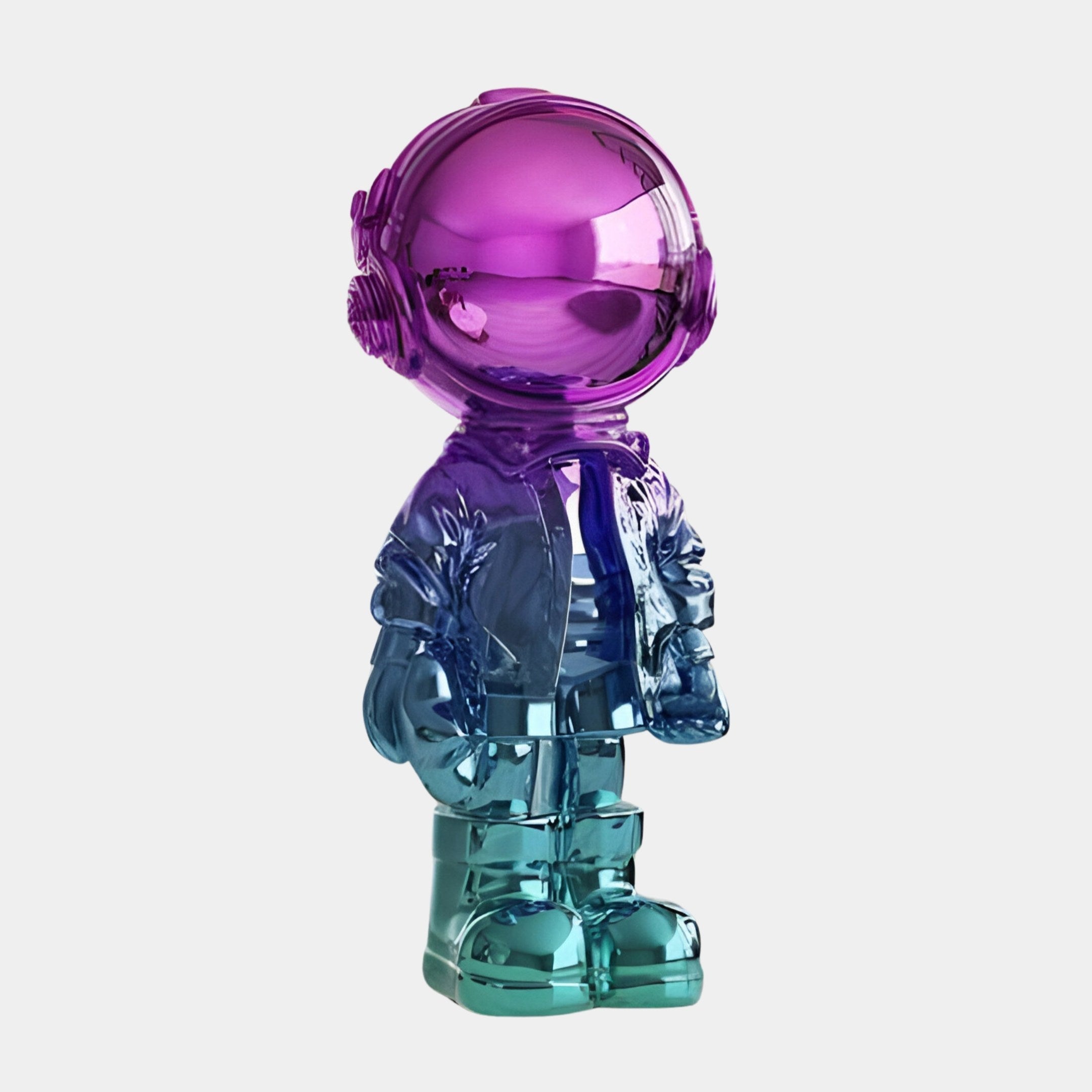 The Giant Sculptures Vibrant Gradient Astronaut Beats Sculpture, standing at 70cm, features shifting hues from purple to teal over its helmet, suit, and boots. Its glossy resin surface creates a stunning contrast against a plain background.