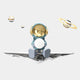 A cartoon astronaut with a gold visor sits on a metallic surface, holding a glowing sphere among three floating planets, inspired by Giant Sculptures Blue 3D Dreamer Glow Astronaut Wall Art.