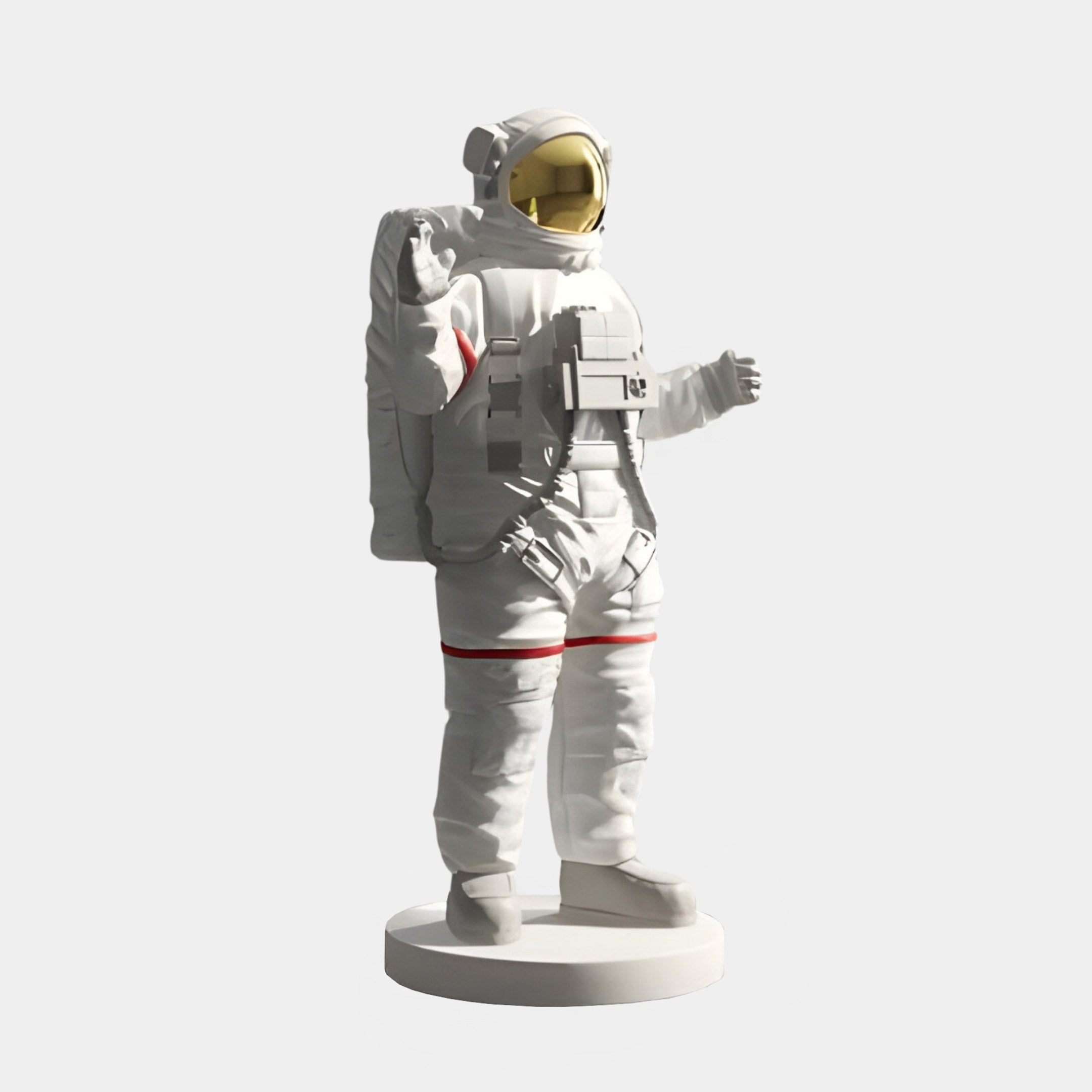 The White Space Astronaut Pioneer Standing Sculpture by Giant Sculptures is an 80cm figurine with a golden visor, red stripes, backpack, and gloves. It stands on a circular base, making it an ideal futuristic home accent for space enthusiasts.