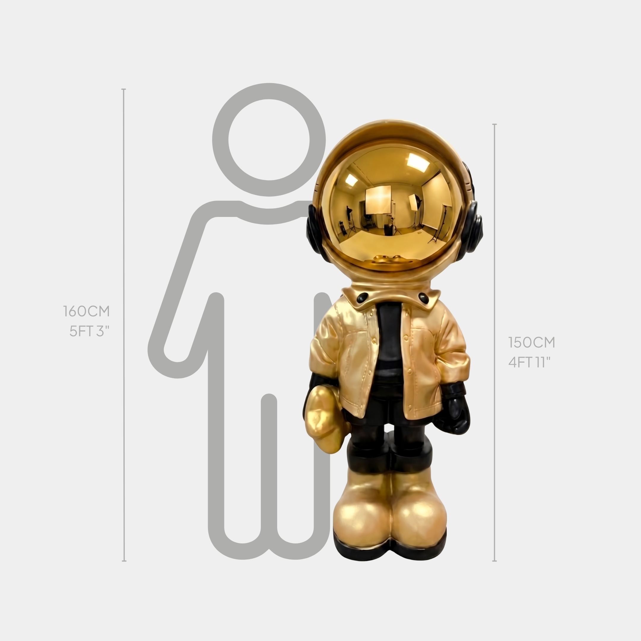 Celestial Gold Astronaut Beats Sculpture by Giant Sculptures, 150cm resin figure in a gold jacket, mirror-gold helmet and boots with black headphones, shown beside a human silhouette for scale.
