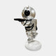 The Astral Silver Astronaut Bear Butler Sculpture (90cm) by Giant Sculptures is a space-themed accent featuring a silver bear astronaut on a white base, holding a black tray with black suit accents and a reflective visor.