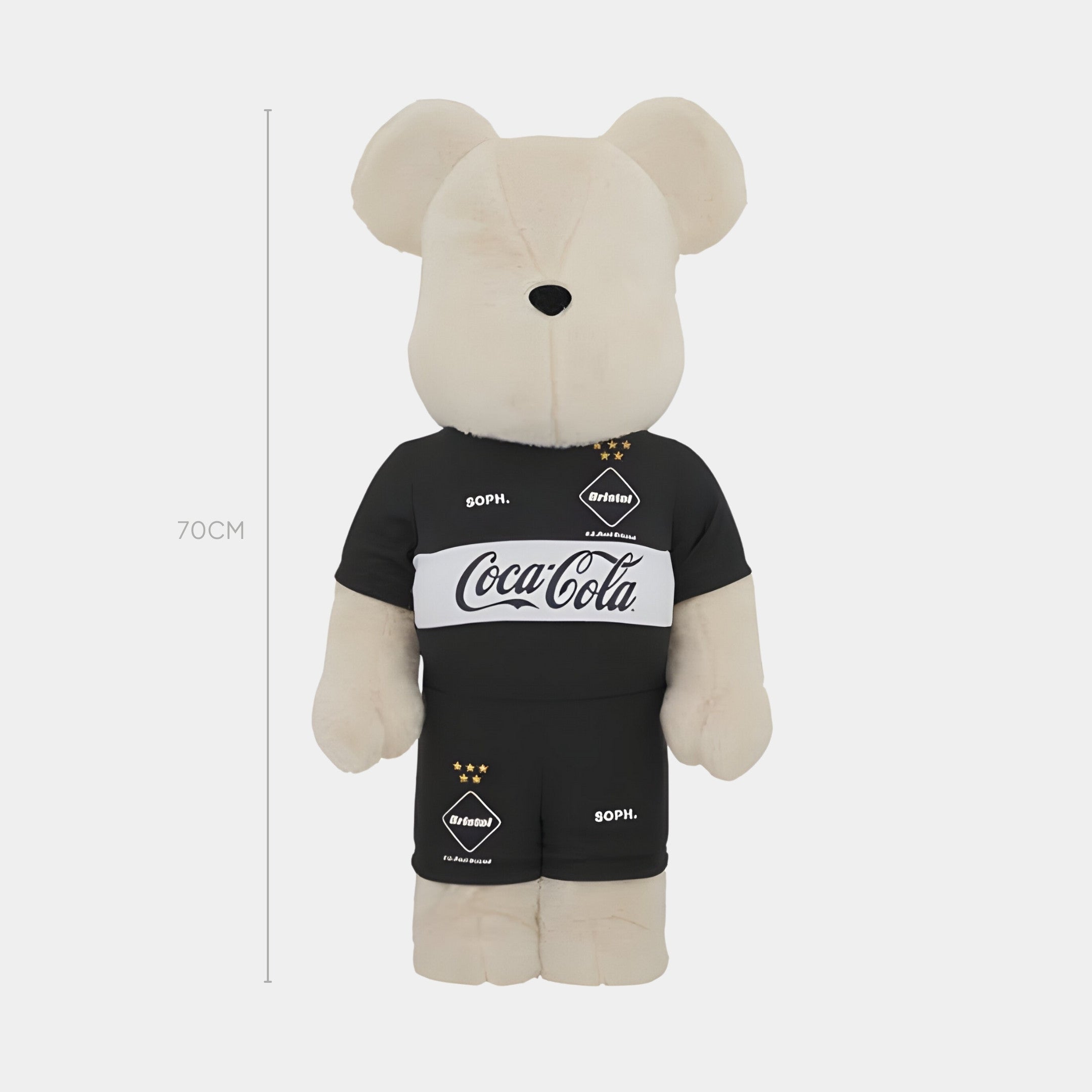 The Giant Sculptures Athlete Plush Bear Sculpture - 70cm features a beige bear in a black sports outfit with Coca-Cola and other logos, standing upright against a white background—an ideal collectible for sports fans.