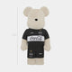 The Giant Sculptures Athlete Plush Bear Sculpture - 70cm features a beige bear in a black sports outfit with Coca-Cola and other logos, standing upright against a white background—an ideal collectible for sports fans.