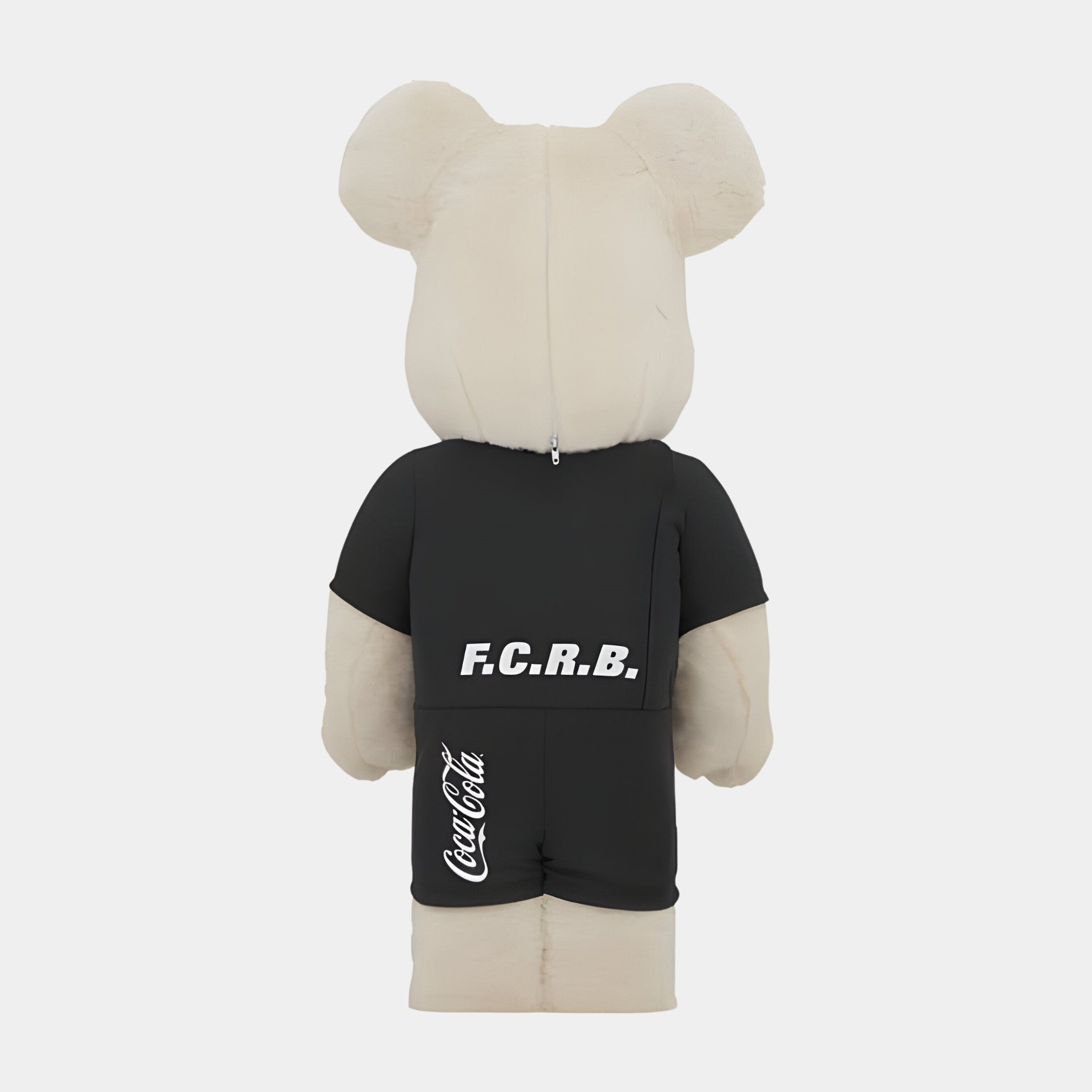 The Athlete Plush Bear Sculpture - 70cm by Giant Sculptures features a beige teddy bear mascot in a black outfit with F.C.R.B. on the back and CocaCola on the left leg, embodying true Sports Spirit against a plain white background.