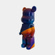 The *Midnight Sunset Bear Sculpture - 50cm* from Giant Sculptures is a limited edition figure with a galaxy palette of blue, purple, orange, and stars. It stands upright on a plain white background and has a smooth, glossy finish.