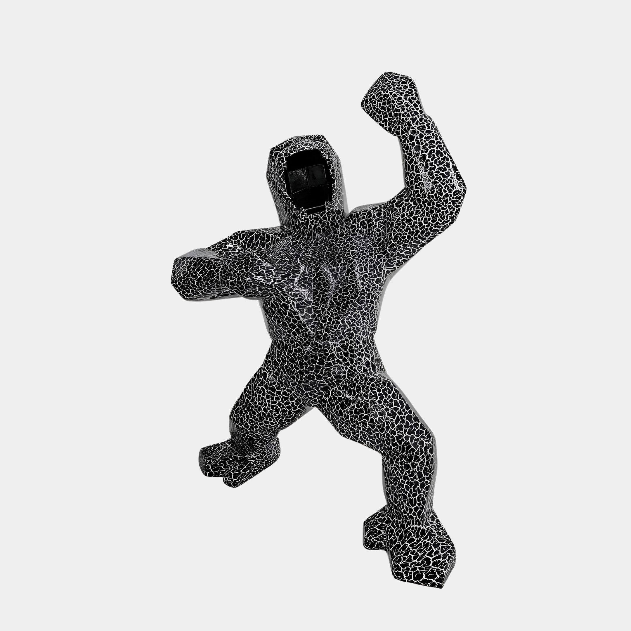 Angular view of Magma Gorilla sculpture, featuring an intricate black magma-like surface, perfect for modern luxury interiors.