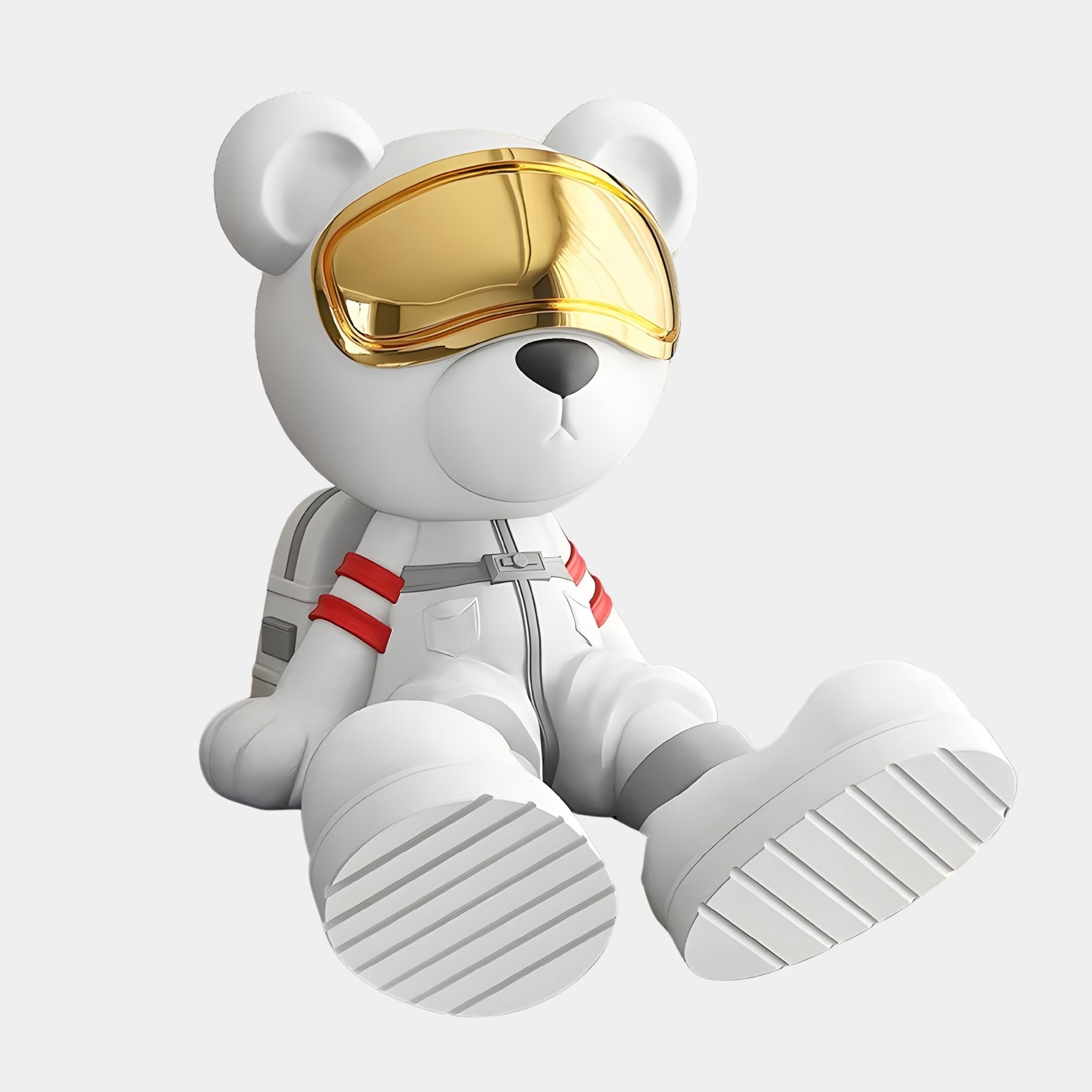 Ideal for space enthusiasts, the Giant Sculptures Nova White Astronaut Bear Sculpture (51cm) features a plush bear in a white suit with red stripes and a golden visor. Sitting against a white background, it exudes an adorable cosmic charm with its round body and outstretched legs.