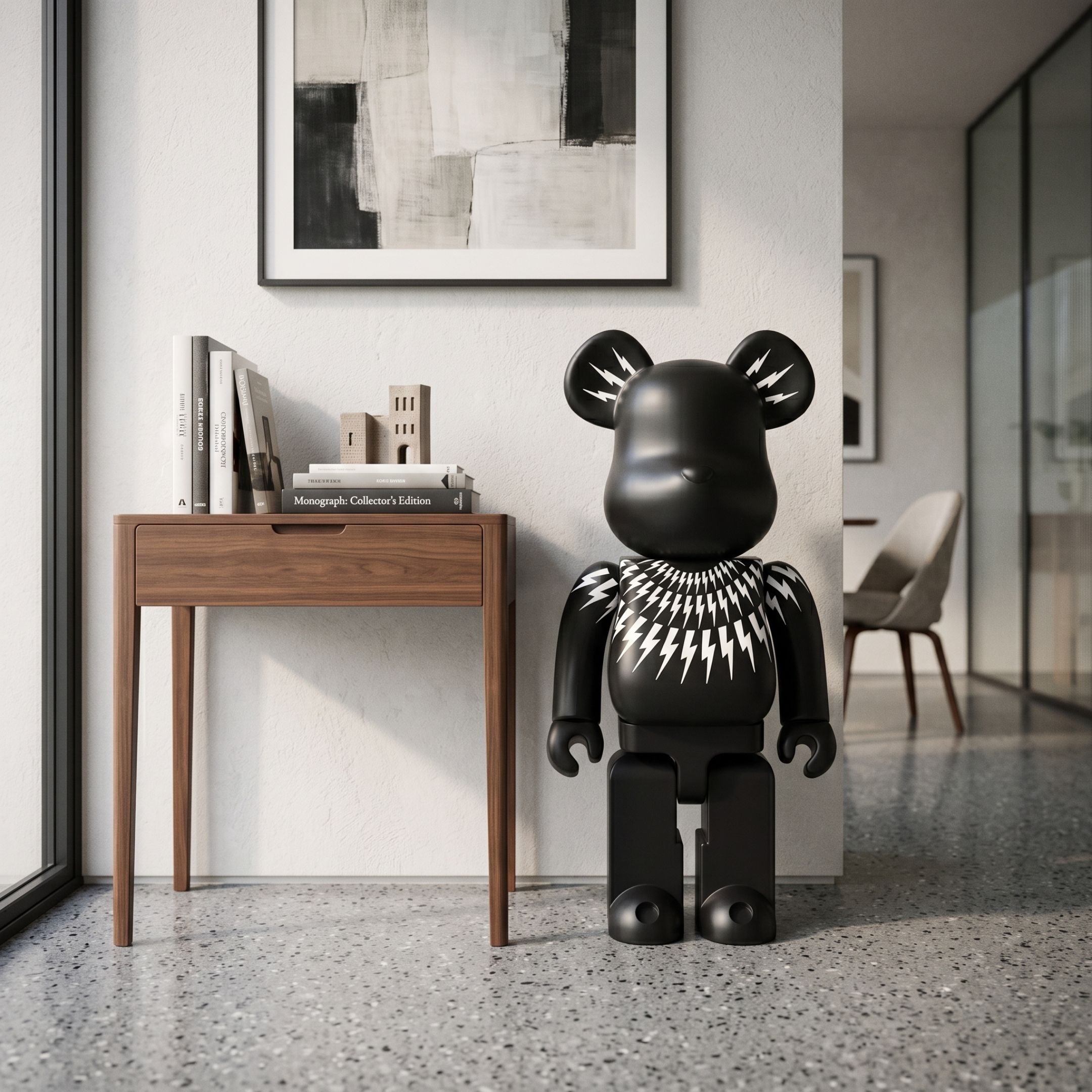 Bolt Collar Black Bear Sculpture, 70cm, matte black resin with white lightning bolt collar motif, standing beside a wooden side table in a modern room.