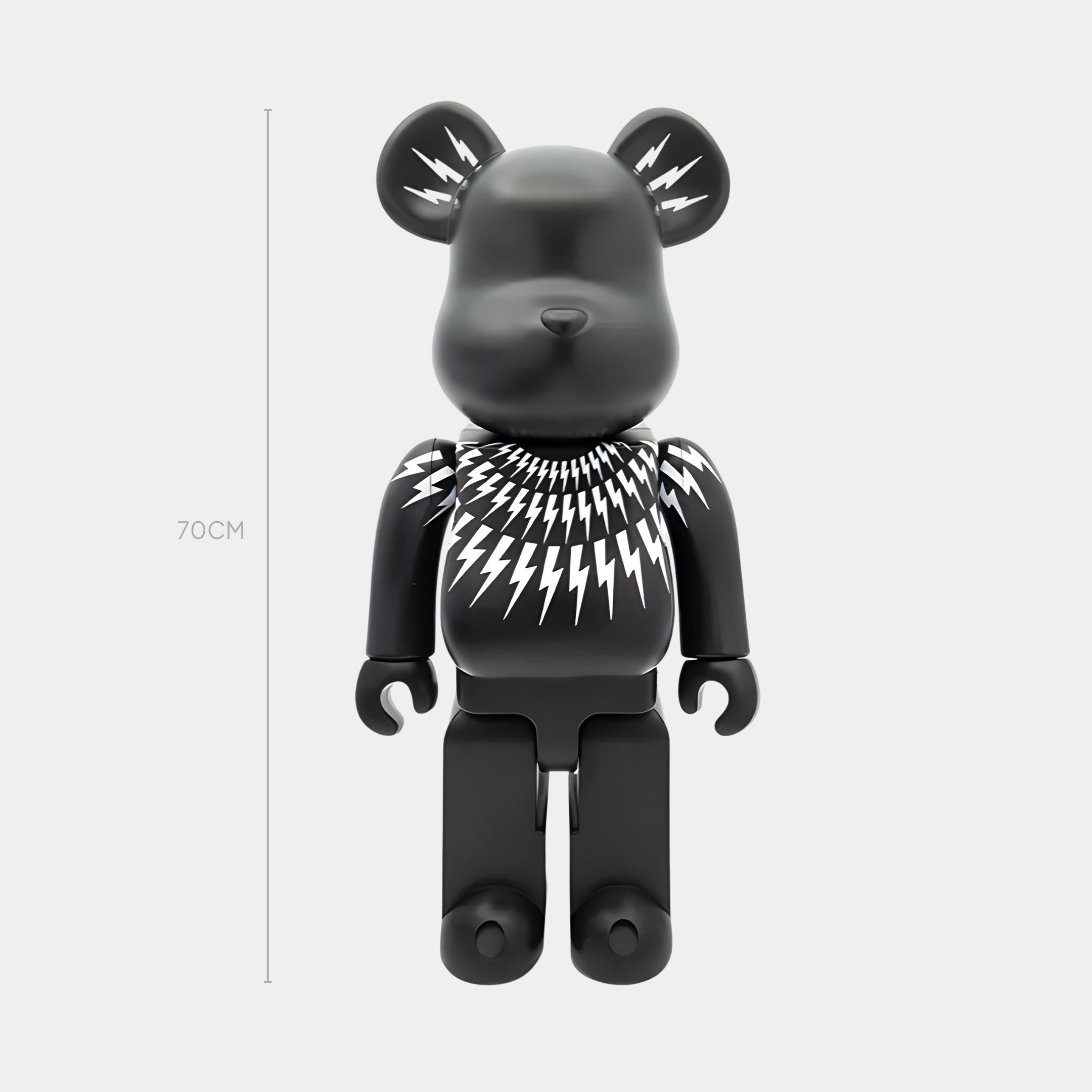 The Bolt Collar Black Bear Sculpture by Giant Sculptures stands 70cm tall with a striking lightning bolt design on its chest and neck, making it a perfect minimalist decor piece against a plain white background.