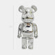 The Bolt Emblem Chrome Bear Sculpture by Giant Sculptures stands upright at 70cm with a reflective silver chrome finish, set against a plain background and proudly featuring the Bolt Emblem.