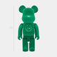 The Giant Sculptures Bolt Emblem Green Bear Sculpture stands 70 cm tall, features a matte-emerald finish, and displays a scratched circular emblem on its chest. This limited-edition piece is shown against a plain white background.