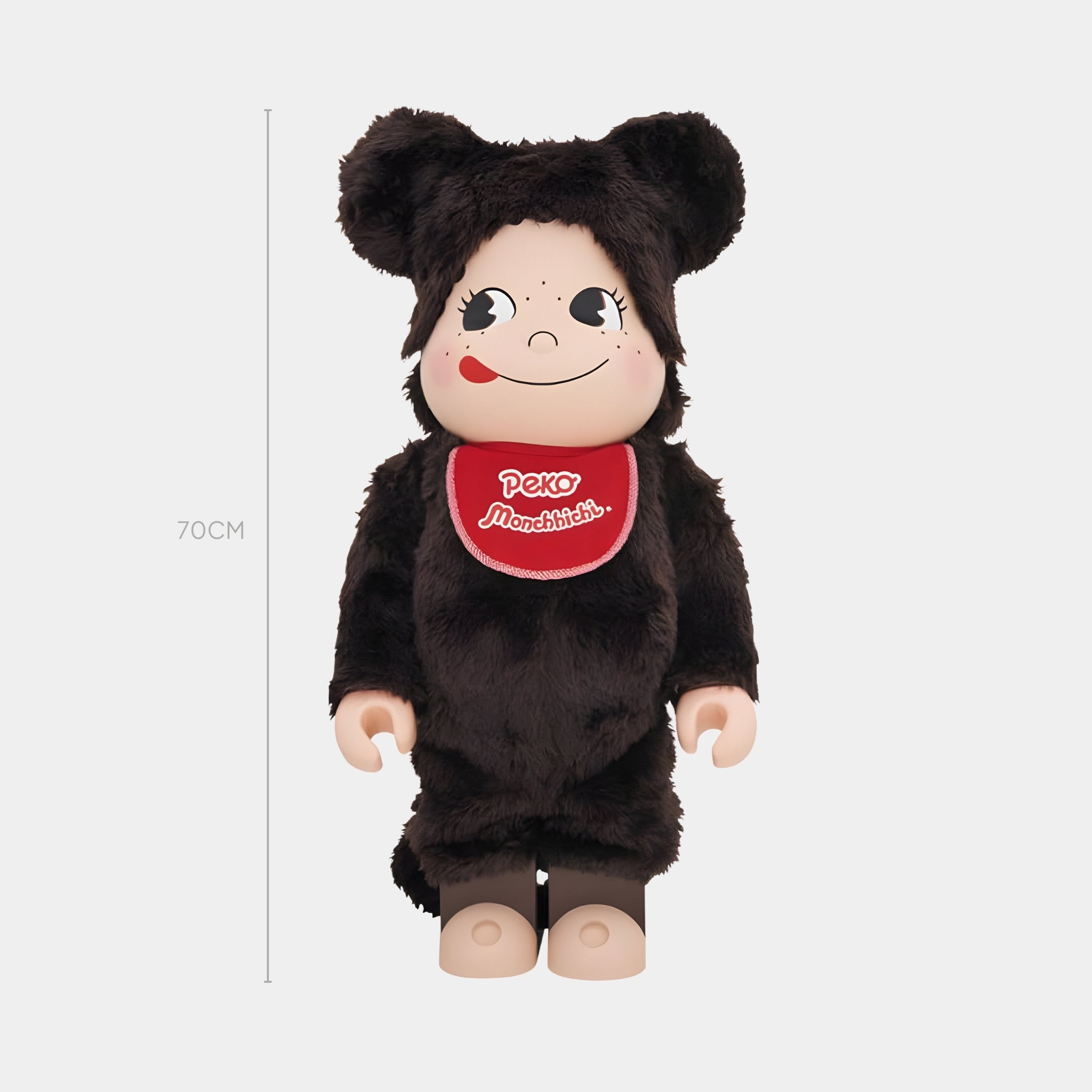 The 70cm Smiley Fuzzy Plush Bear Sculpture by Giant Sculptures features a playful face, rosy cheeks, big eyes, faux fur bear costume, red bib with Japanese writing, and a cheerful tongue sticking out for added charm.