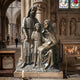 Life-Size Classical Holy Family Bronze Sculpture, 200cm, by Giant Sculptures, showing robed male, seated female with open scroll, and child, displayed inside a cathedral.