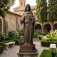 Monumental Classical Standing Virgin Mary Bronze Statue by Giant Sculptures in a stone courtyard garden with hydrangeas, fountain, and memorial plaque plinth.