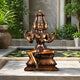 Large Traditional Four-Armed Brahma Bronze Sculpture, 110cm, seated four-faced deity with one leg extended, on a lotus-relief plinth beside an outdoor pond.