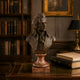 Classical Portrait Bust Bronze Bust - 60cm by Giant Sculptures, Mozart likeness on marble base, displayed on a desk in a study with bookshelves and framed art.