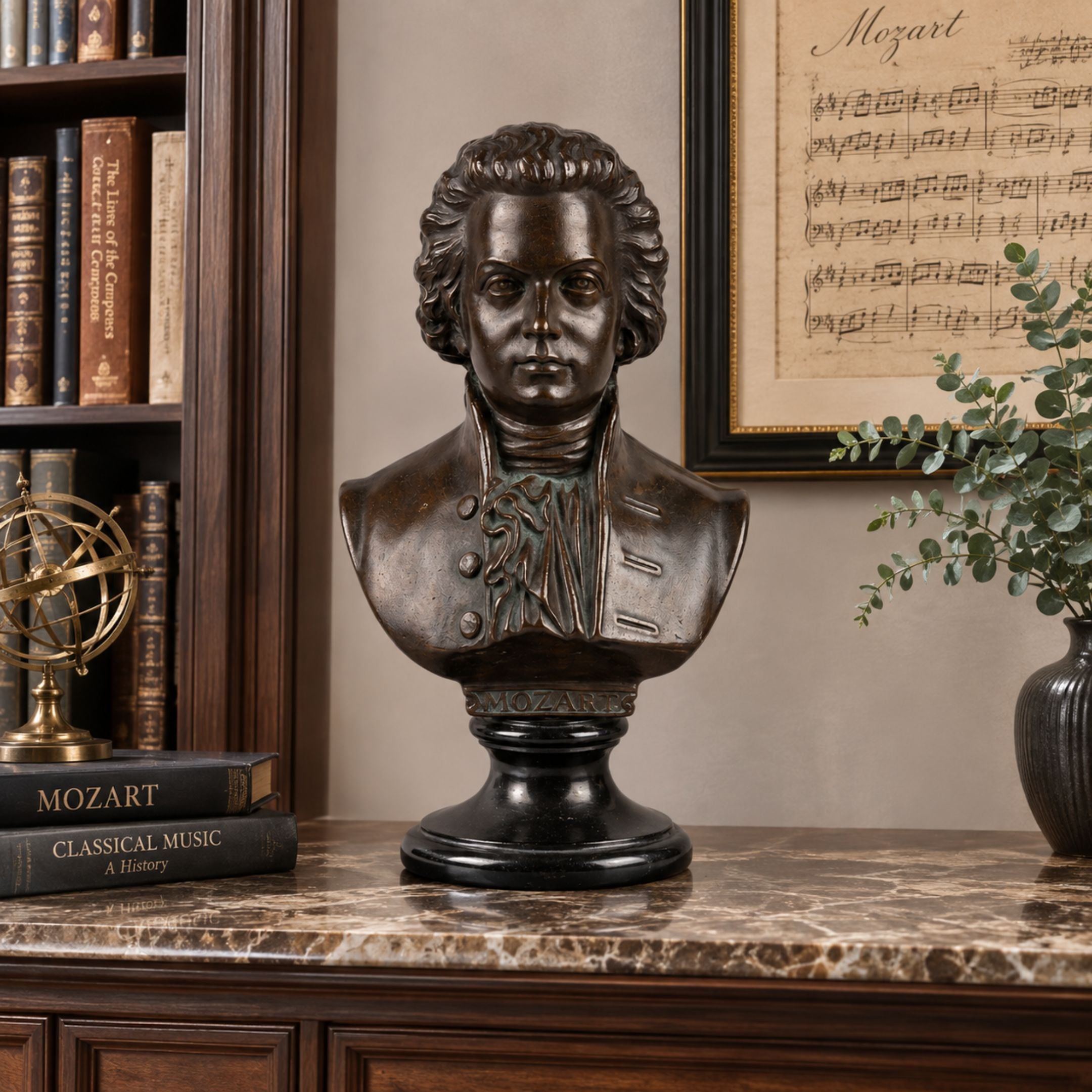 Classical Mozart Composer Bronze Bust, 55cm, on a bookshelf with books, a globe, and framed sheet music in a study setting.
