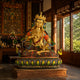 Life-Size Traditional Seated Vajrasattva Bodhisattva Bronze Statue - 250cm in gold finish with colorful enamel robes, displayed on a lotus base in a temple-style interior.