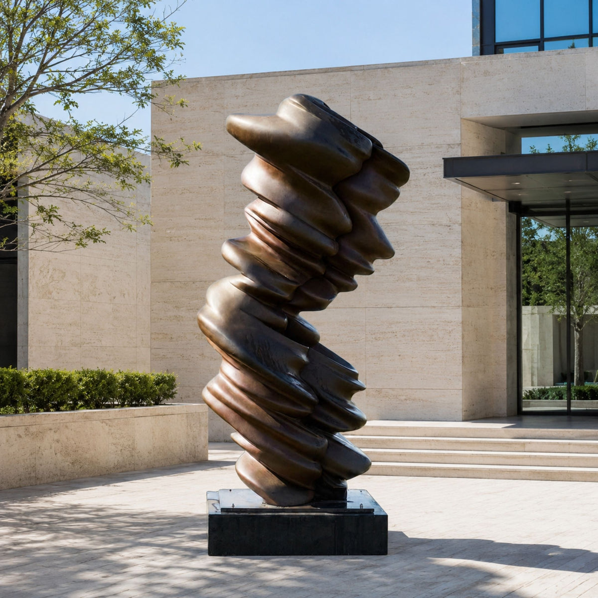 Monumental Contemporary Twisting Tornado Bronze Sculpture, 260cm, dark patina spiral form on a black base outside a stone building entrance.