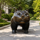 Monumental Contemporary Rotund Standing Cat Bronze Sculpture, 220cm, dark bronze finish with gold whiskers, standing on a paved garden path amid greenery.