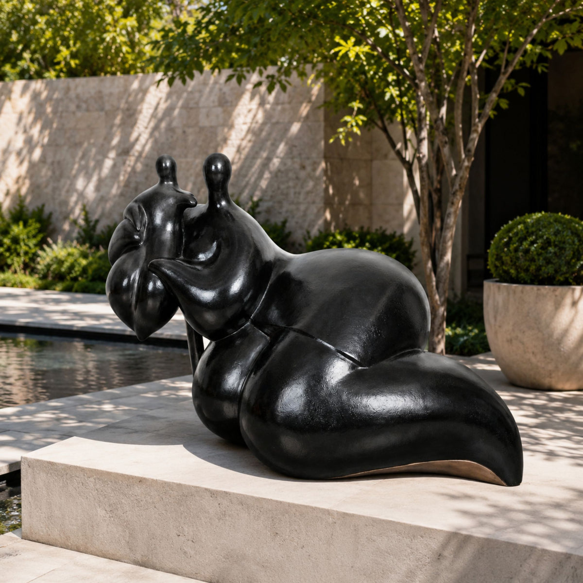 Large Contemporary Abstract Reclining Figure Bronze Sculpture, 120cm, in black cast bronze on a stone plinth beside a garden pool and potted greenery.