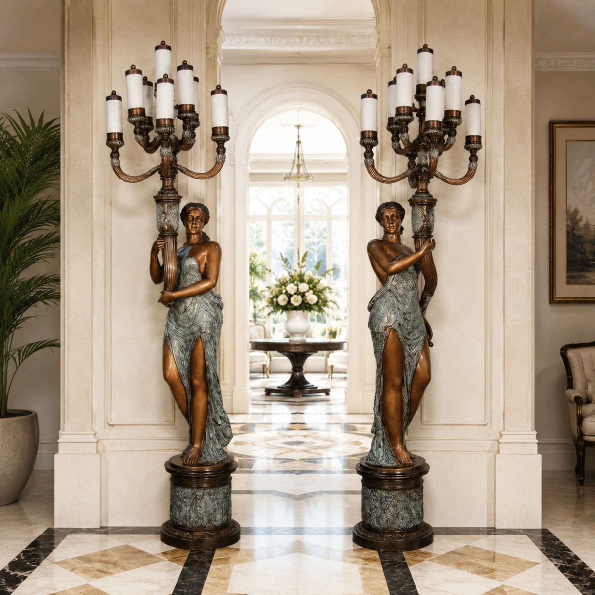 Large Classical Candelabra Torchiere Figure Bronze Sculpture, 220cm pair of draped female figures holding nine-arm candelabra, flanking an arched hallway entrance.