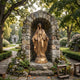 Life-Size Classical Virgin Mary Bronze Statue by Giant Sculptures in blessing pose within a stone archway grotto, set in a garden path with benches.