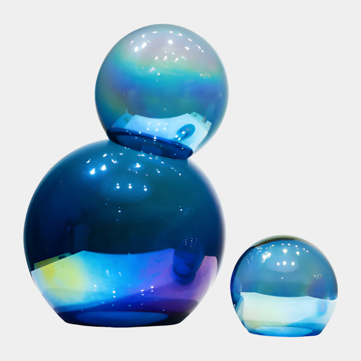 Blue Iridescent Stacked Sphere Glass Sculpture - 44cm, a deep blue stacked double sphere with a paler aqua orb beside it, iridescent finish, on a plain white background.