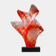 Red Fanned Spiral Resin Sculpture - 63cm by Giant Sculptures, three ribbed fans swirling from a red stem to pale pink edges, on a black base against a plain background.