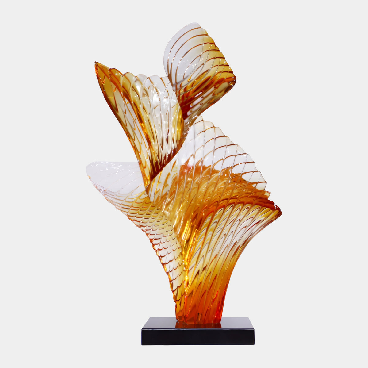 Amber Furled Leaf Resin Sculpture on Marble (102cm) with two spiraling, diamond-lattice textured forms shading from red-orange to clear, on a black base against a plain white background.