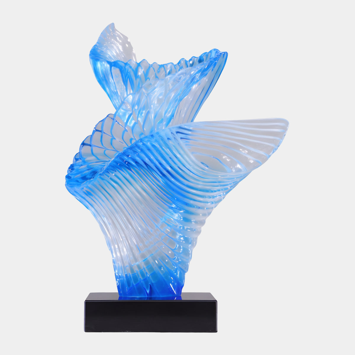 Cobalt Blue Fanned Spiral Resin Sculpture (63cm) with ribbed, twisting fans in blue and icy white tones on a black base, set against a plain light background.