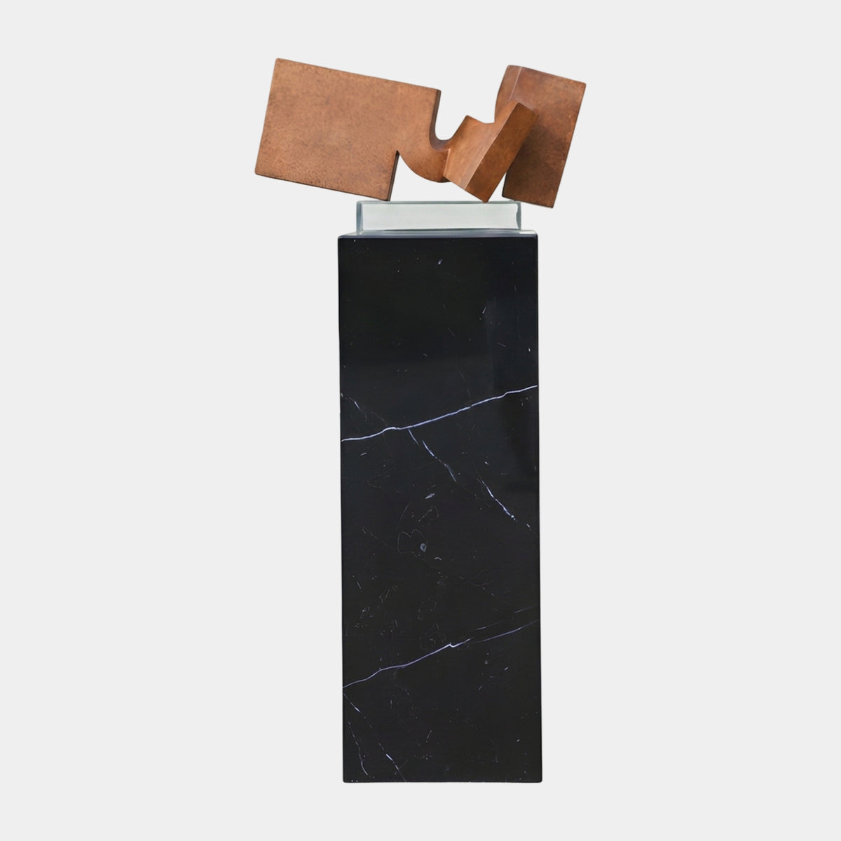 Rust Brown Folded Plate Metal Sculpture, 171cm, on a clear acrylic block atop a black veined marble plinth, set against a plain white background.