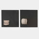 The Modulus Black & White Duo Panel Abstract Wall Art by Giant Sculptures features two black square panels, each displaying a sleek stack of white discs—an elegant, contemporary piece with a subtle wabi-sabi touch.