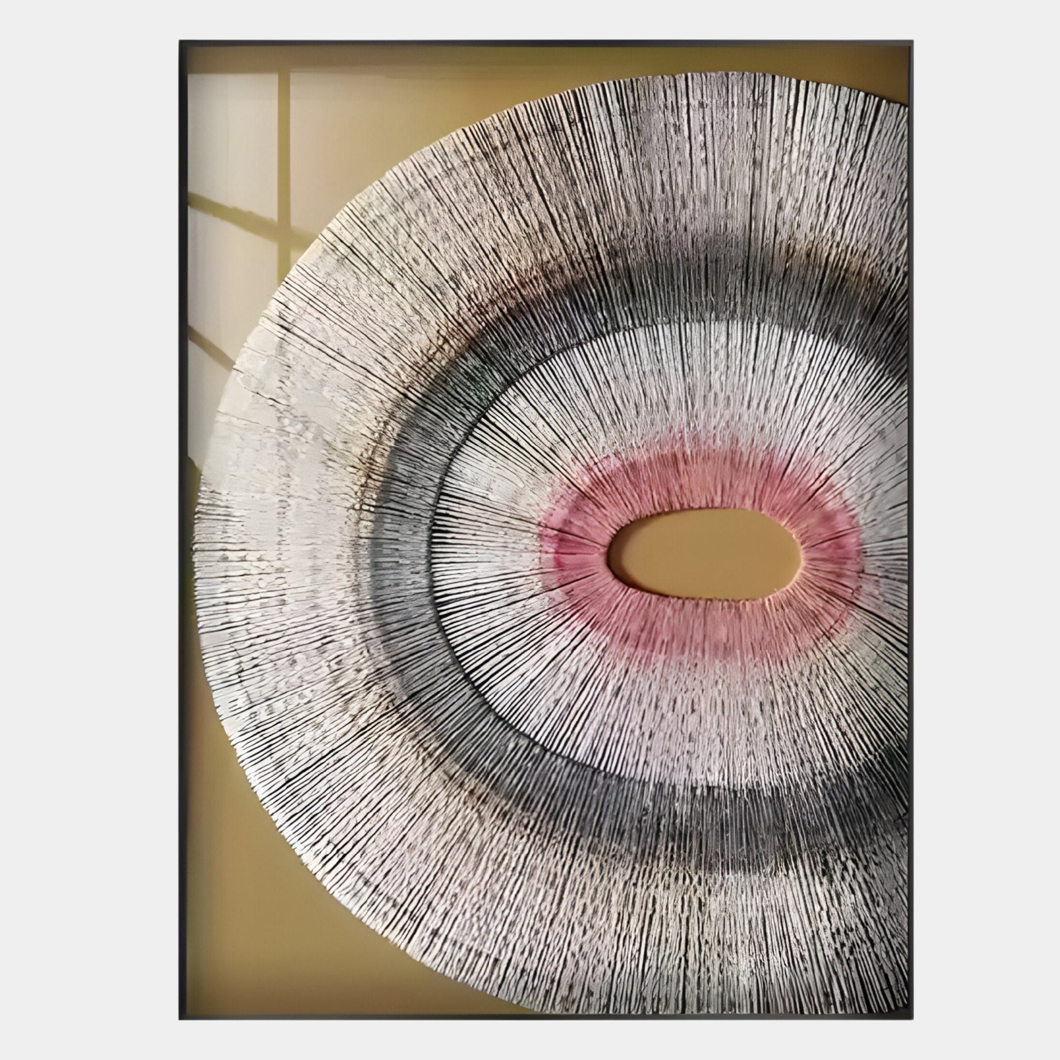 The Auralis Pink Accent Concentric Circular Cardboard Craft Wall Art by Giant Sculptures features a large circular pattern with radiating lines in white, gray, black, and pink accents—ideal for contemporary interiors.
