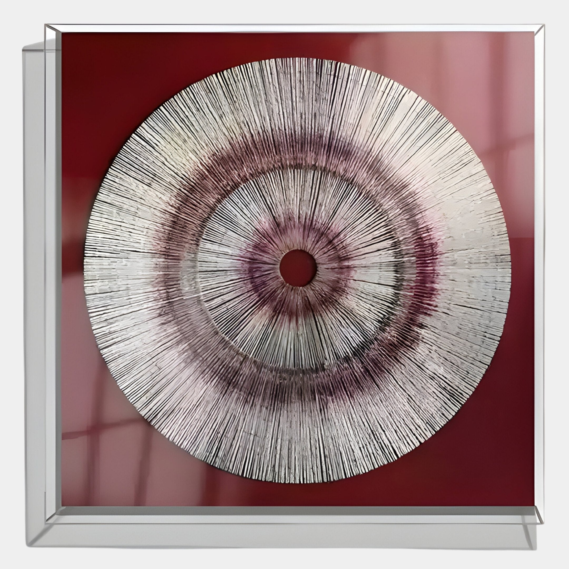 The Oculis Crimson Aura Square Handmade 3D Paper Wall Art by Giant Sculptures features concentric black lines and shades of purple and white on red, set in a clear square frame—an eye-catching contemporary piece for modern décor lovers.
