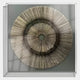 The Oculis Earthy Balance Square Handmade 3D Paper Wall Art by Giant Sculptures features metallic, sunburst-like lines in a transparent square frame, casting delicate shadows and adding a striking accent to any light-colored wall.