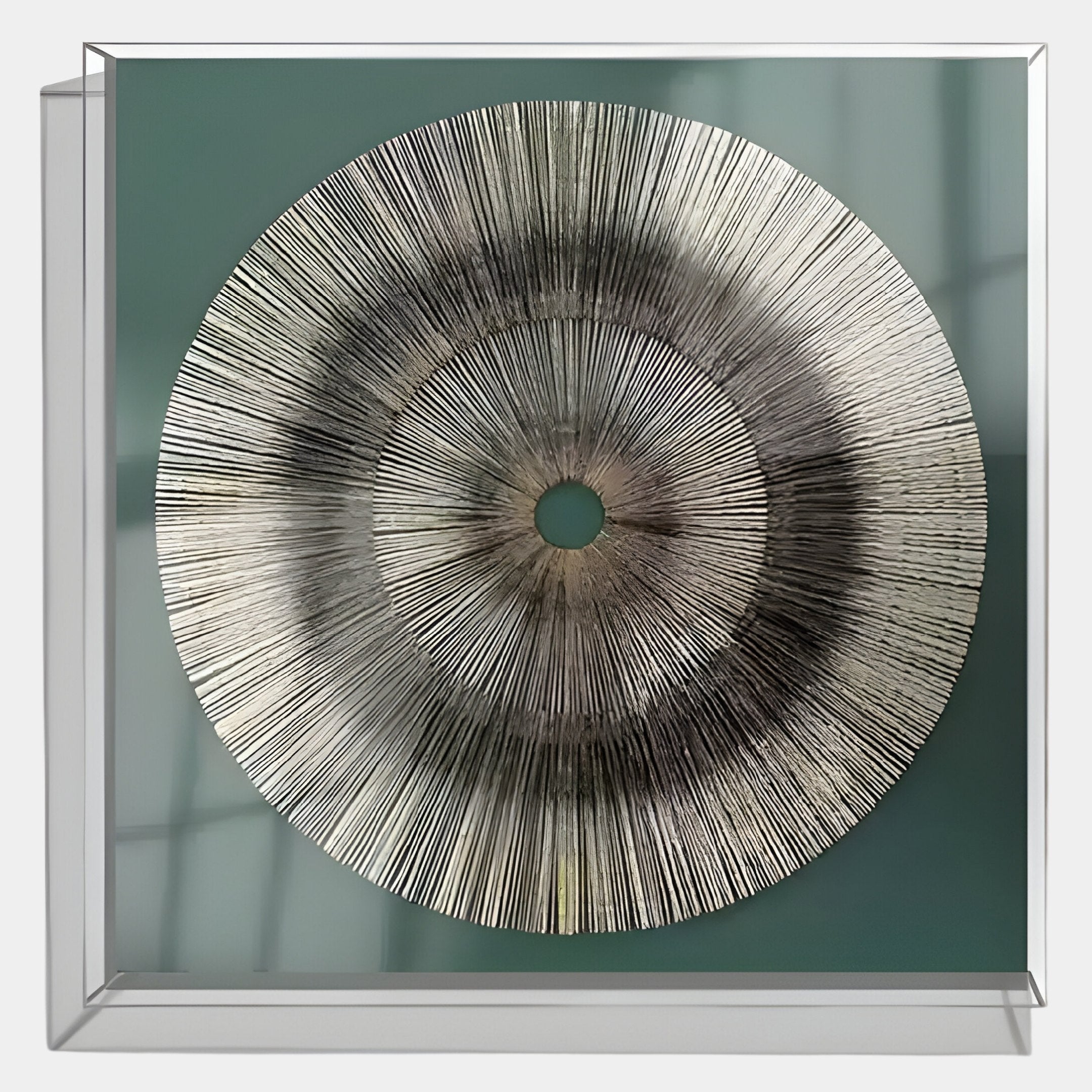 Oculis Emerald Horizon Square Handmade 3D Paper Wall Art by Giant Sculptures features radiating black and silver lines on a soft green backdrop, mounted in acrylic with a central hole, creating a bold geometric pattern.