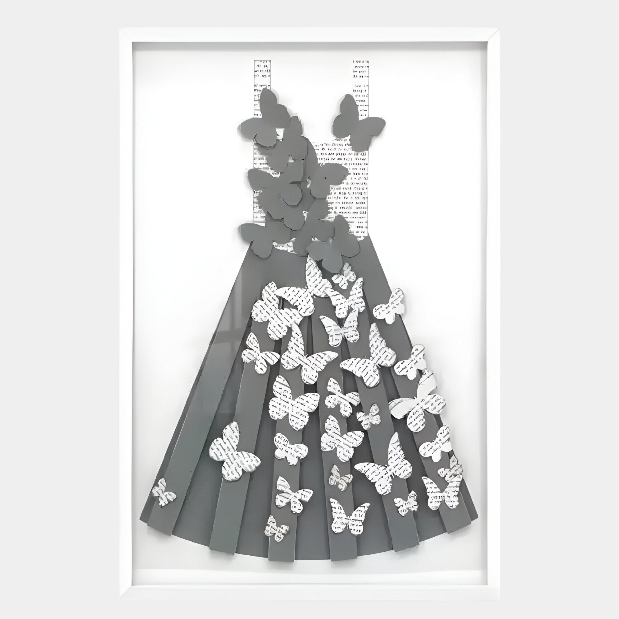 The Flutter Charcoal & White Butterfly Dress 3D Wall Art by Giant Sculptures showcases a pleated gray paper dress with text-printed white butterflies, set on a white background for a minimalist, Nordic-inspired elegance.