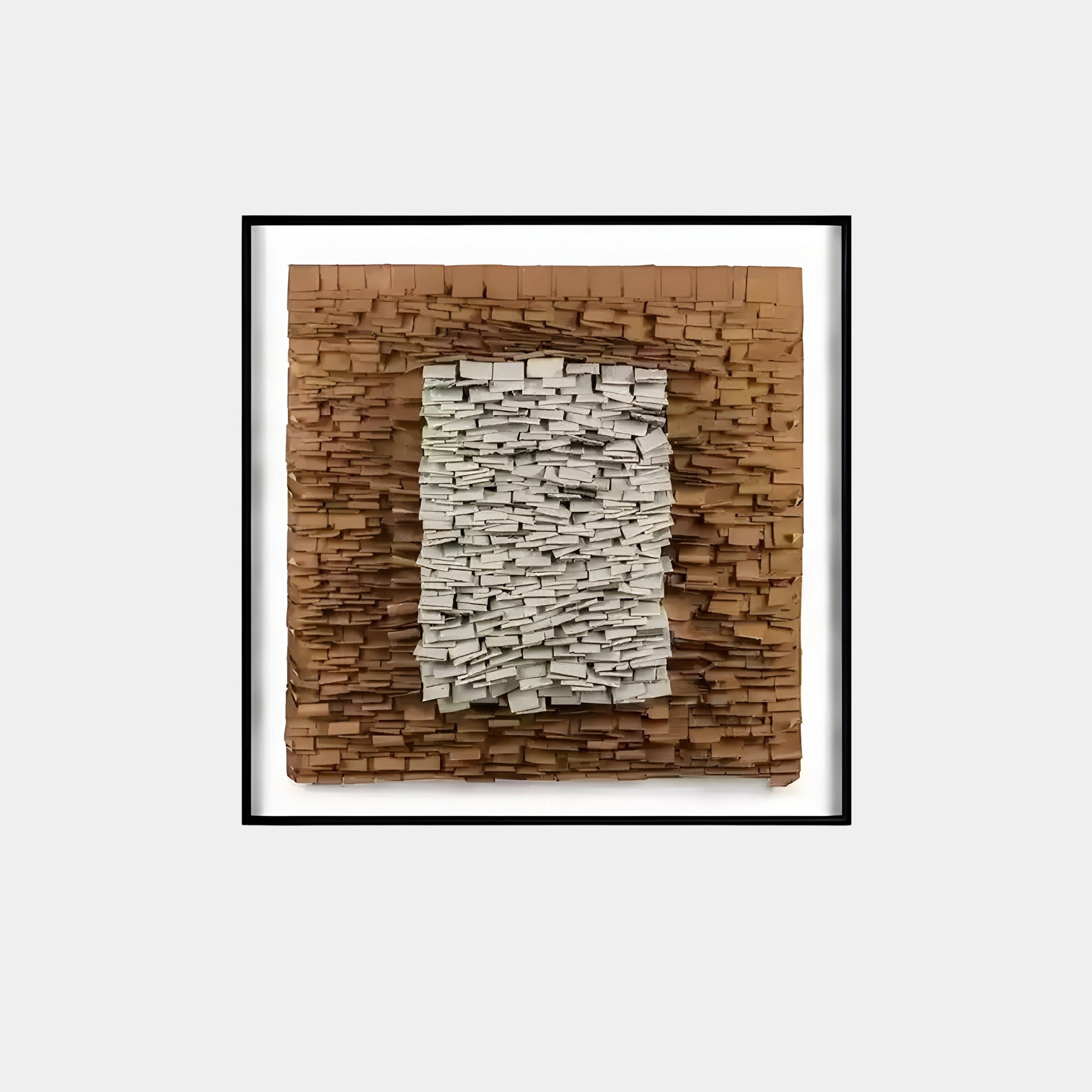 The Terracova Warm Ochre Frame Textured Cardboard Square 3D Wall Art by Giant Sculptures showcases stacked rectangular pieces in a warm ochre frame. The outer layer is brown, and the center white, creating a captivating three-dimensional appearance.