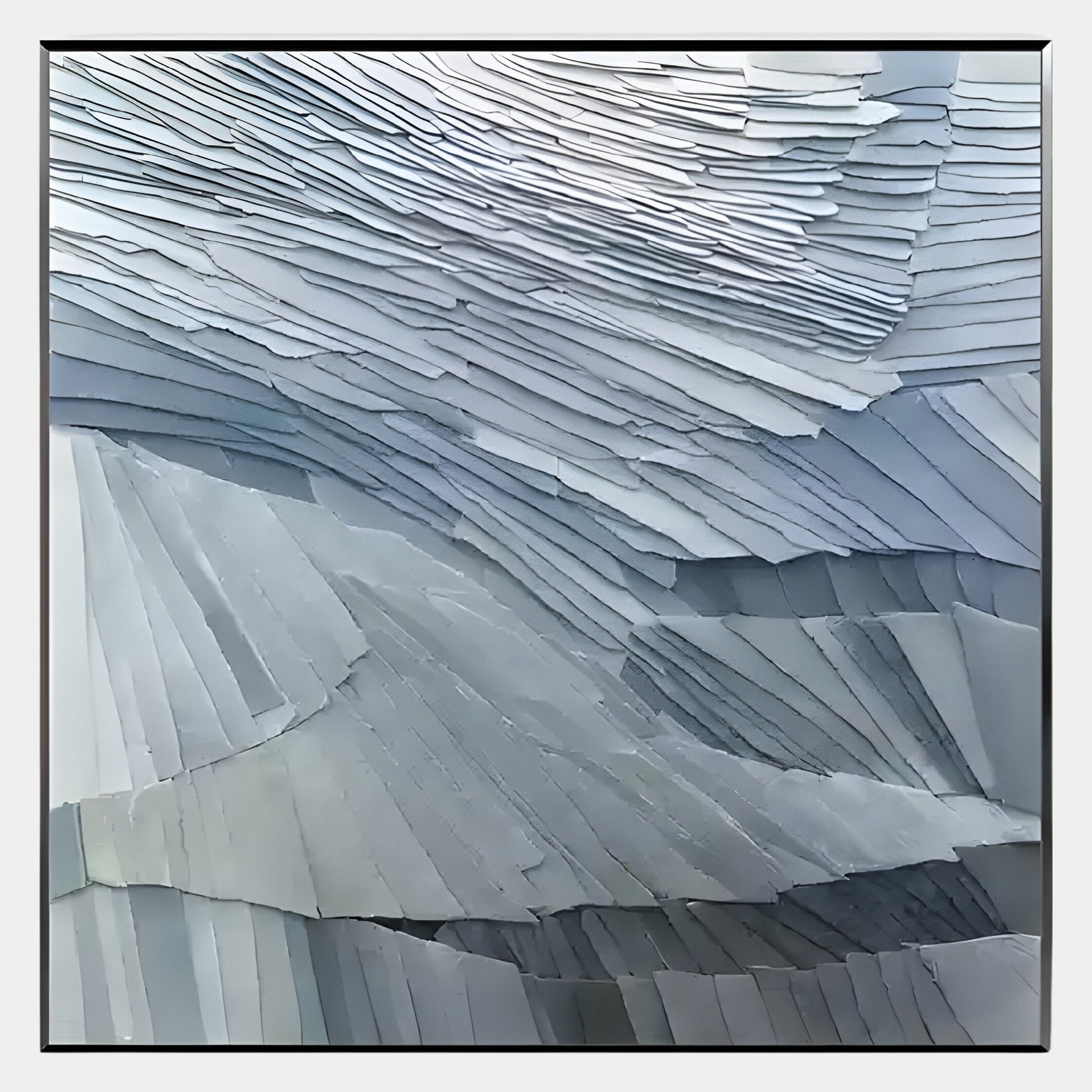 The Terrane Tranquil Blue Layered Abstract Wall Art by Giant Sculptures features overlapping sheets in gray and blue, forming a wave-like texture. Its modern Wabi-sabi style brings depth and quiet elegance to any space.